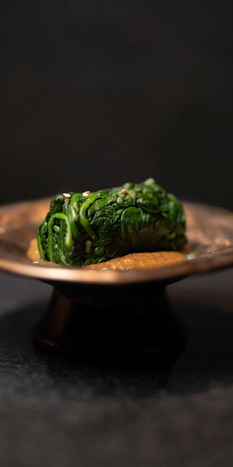 Gomae spinach salad on elevated plating